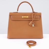 Hermes KELLY 35 Gold Ardennes Leather Handbag - Sold for $12,800 on 10-11-2026 (Lot 674).jpg